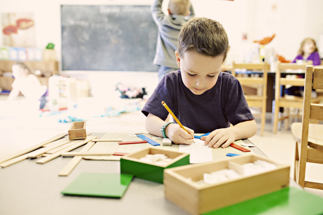 boy-working-on-math-skills-at-school_t20_YQ3Nb4
